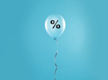 Image of Discount offer. Balloon with percent sign on light blue background