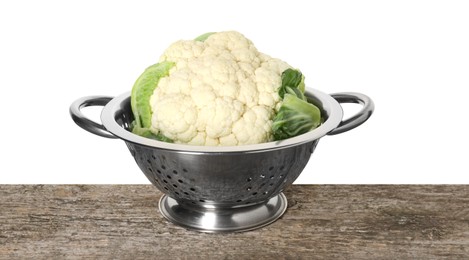 Photo of Metal colander with cauliflower on wooden table against white background