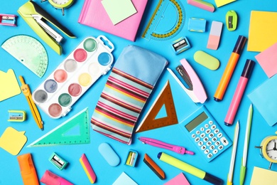 Photo of Different stationery on light blue background, flat lay. Back to school