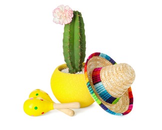 Photo of Mexican sombrero hat, cactus and maracas isolated on white