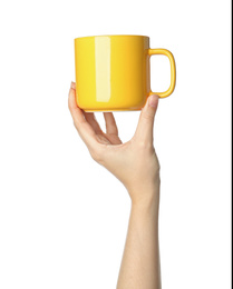 Photo of Woman holding yellow cup on white background, closeup