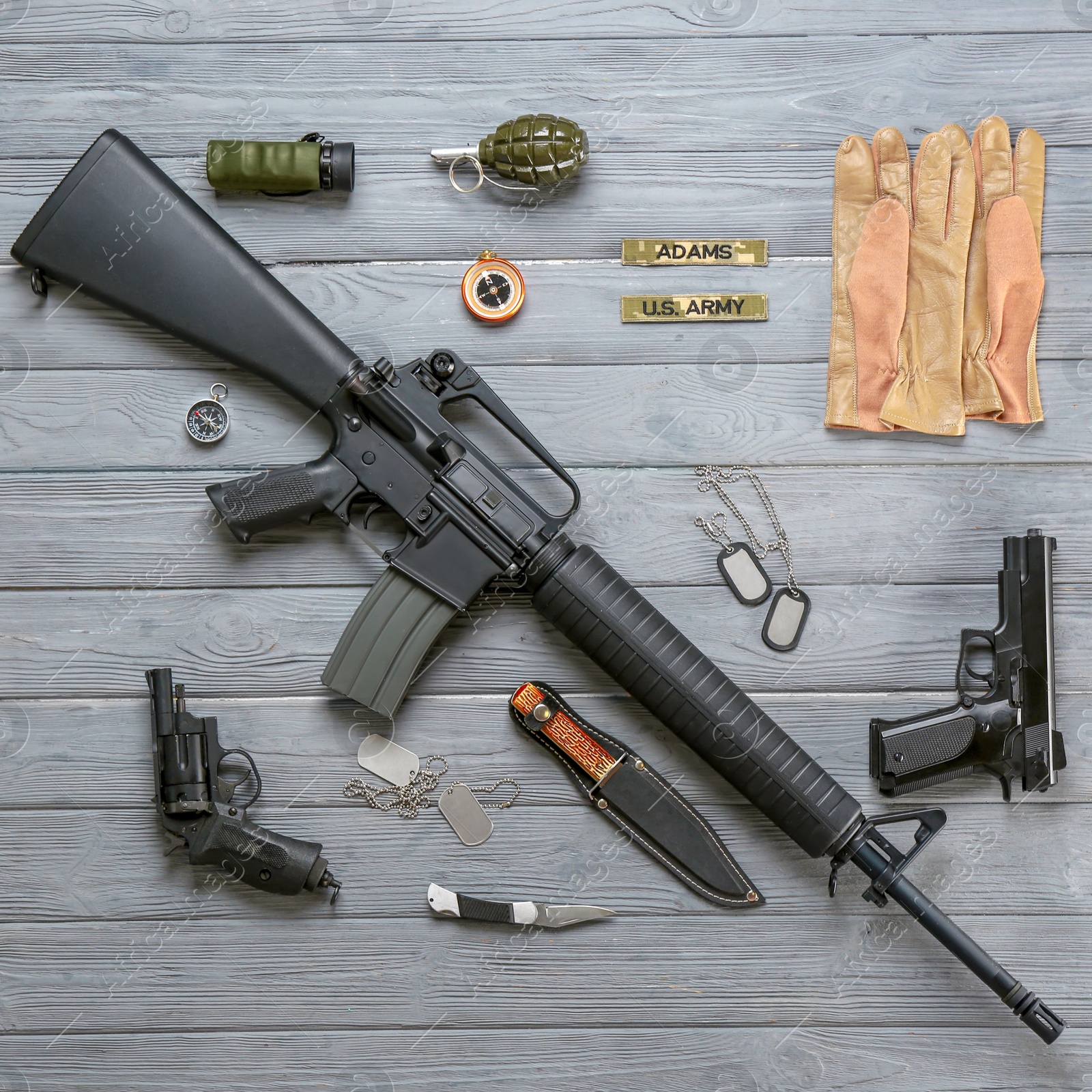 Photo of Set of military equipment on wooden background, flat lay