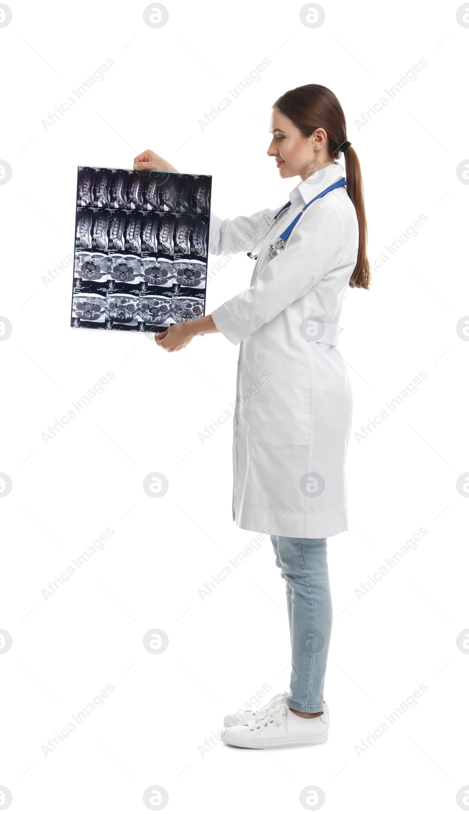 Photo of Orthopedist holding X-ray picture on white background