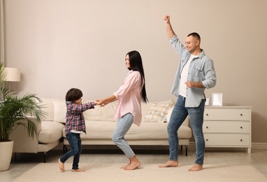 Photo of Happy family spending time together at home