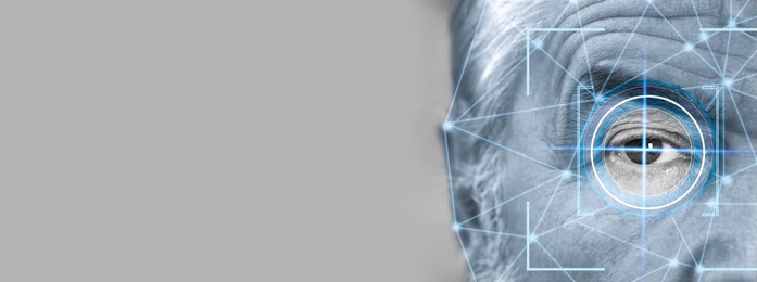 Image of Facial and iris recognition. Man with digital biometric grid and scan, closeup. Banner design with space for text