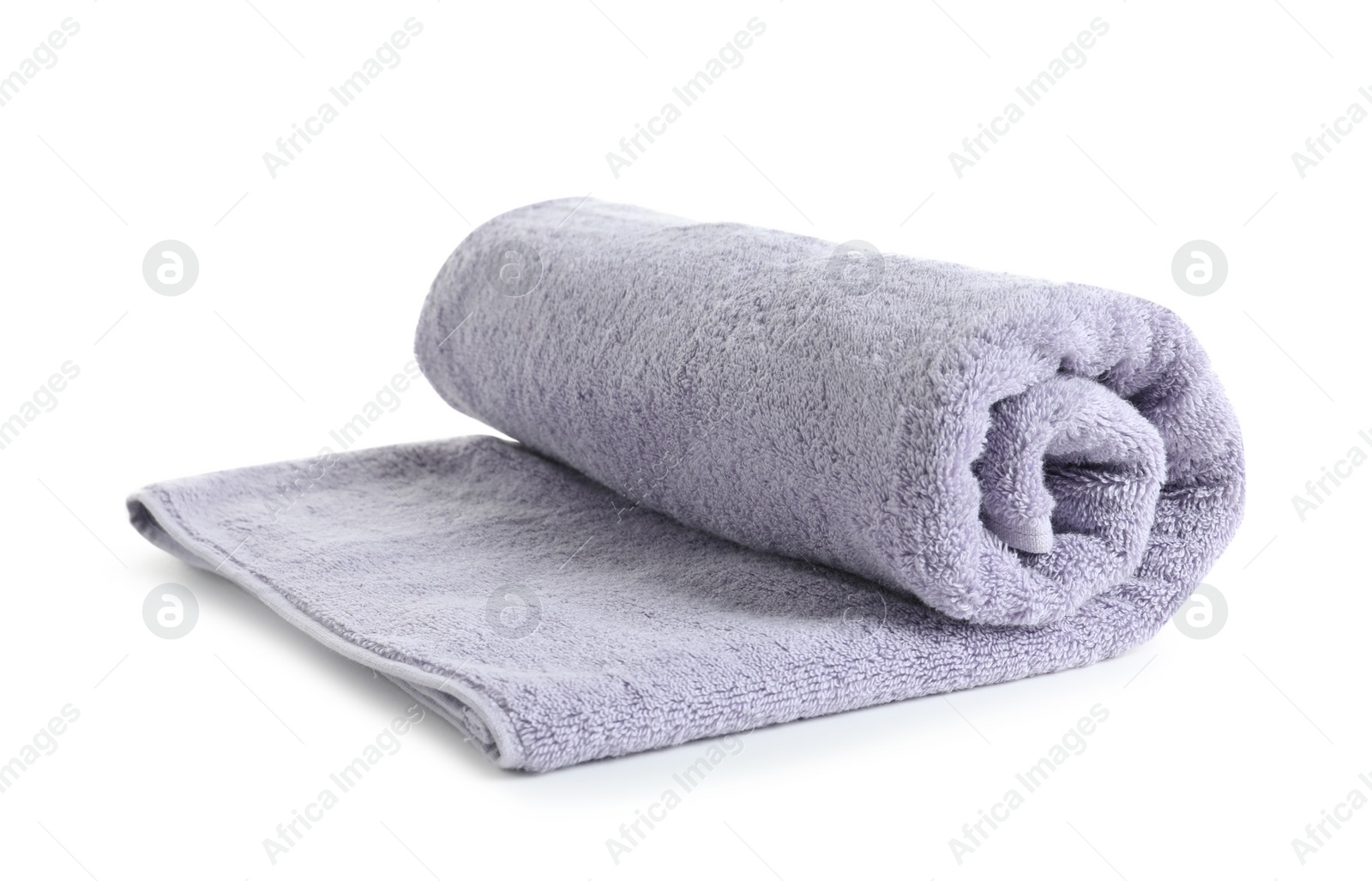 Photo of Fresh soft rolled towel isolated on white