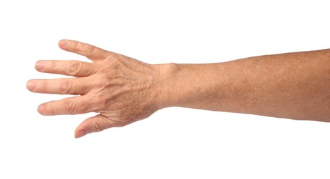 Closeup view of woman's hand with aging skin