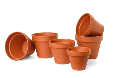 Photo of Empty clay flower pots isolated on white