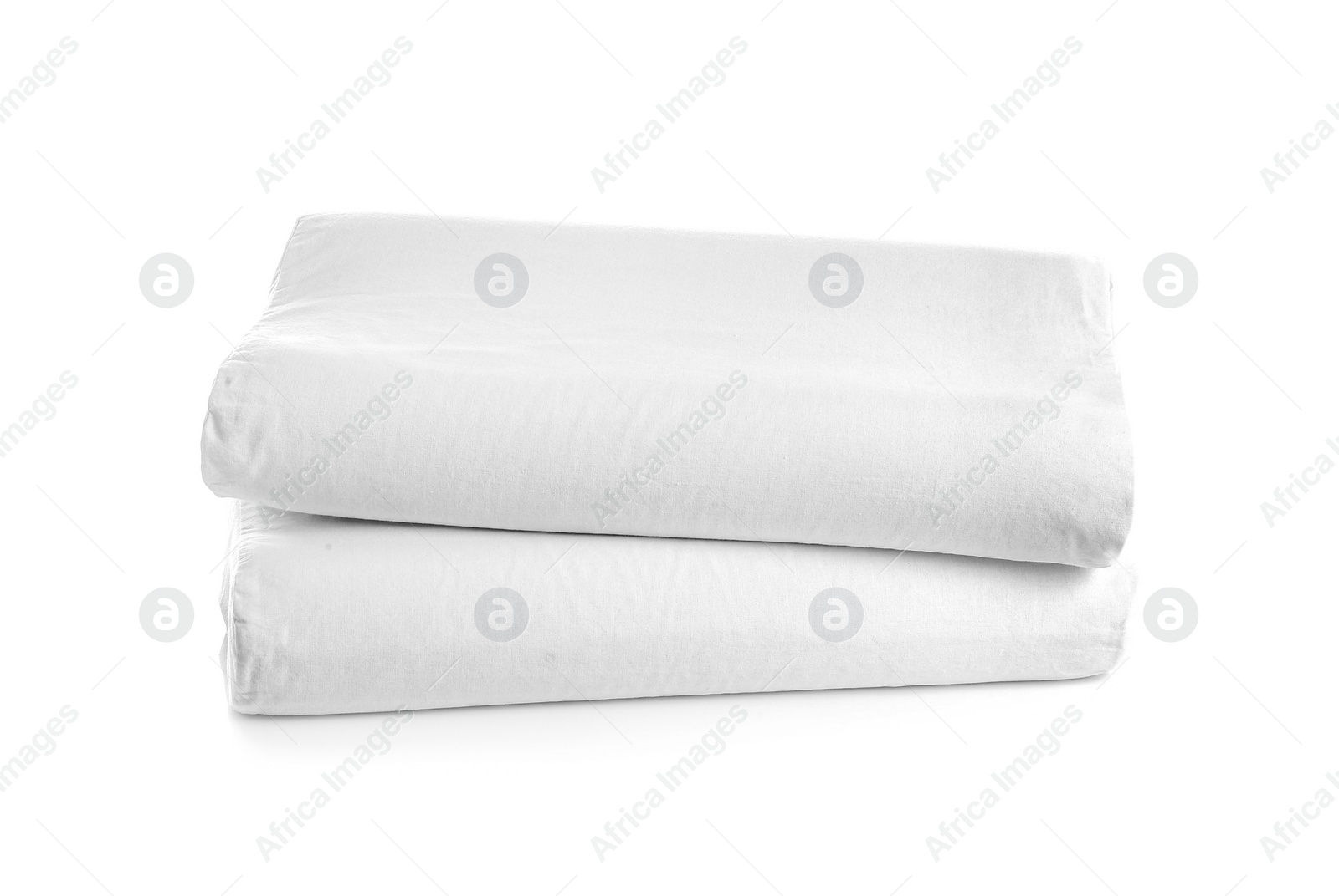 Photo of Clean soft orthopedic pillows on white background