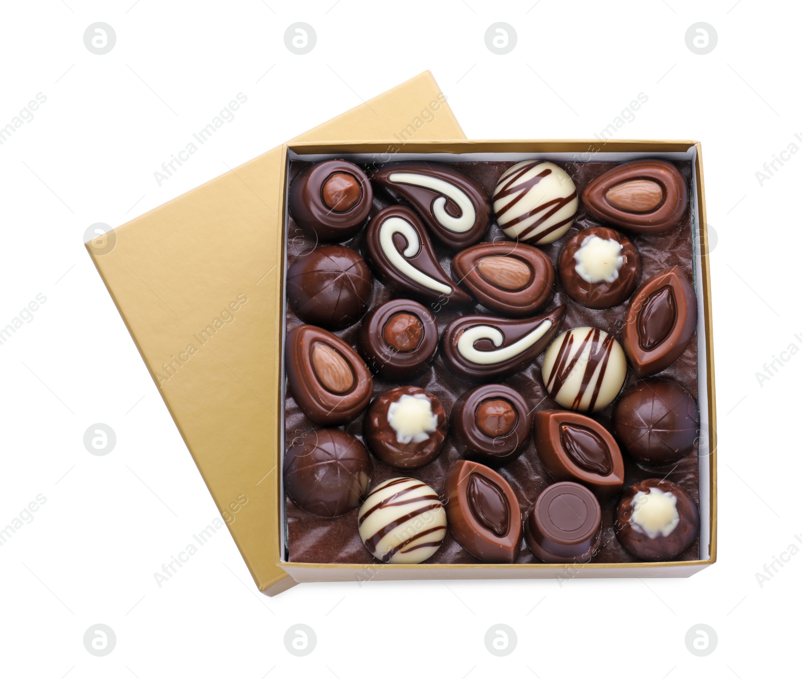 Photo of Box of delicious chocolate candies isolated on white, top view