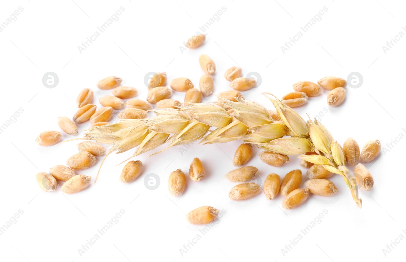 Photo of Pile of wheat grains and spike on white background