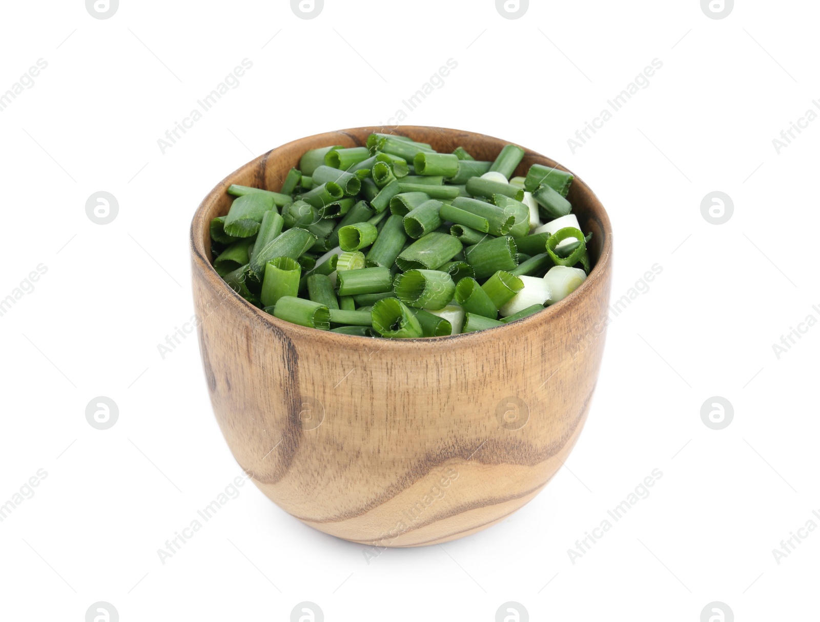 Photo of Cut green spring onion in wooden bowl isolated on white