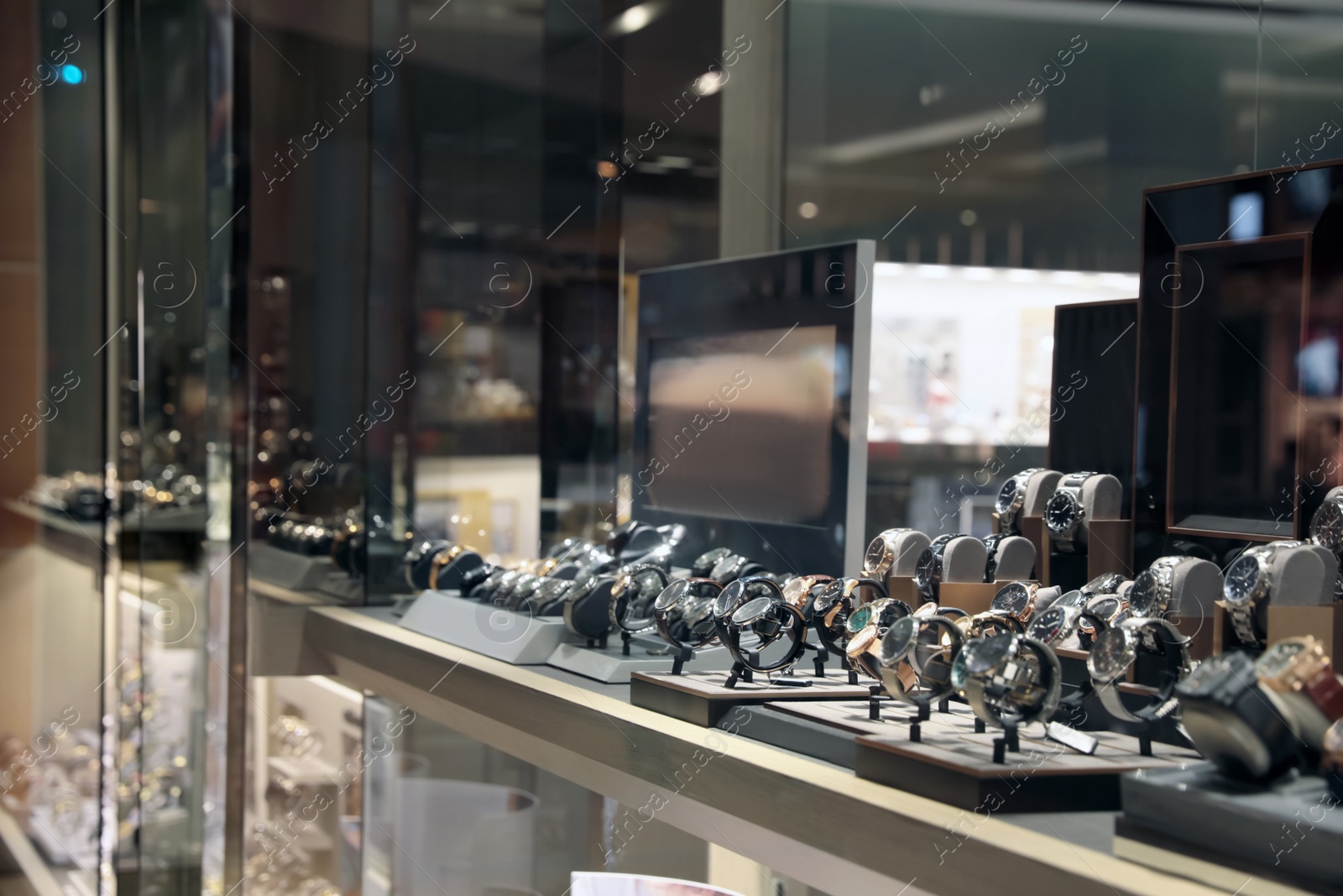 Photo of Showcase with luxury watches in beautiful shop