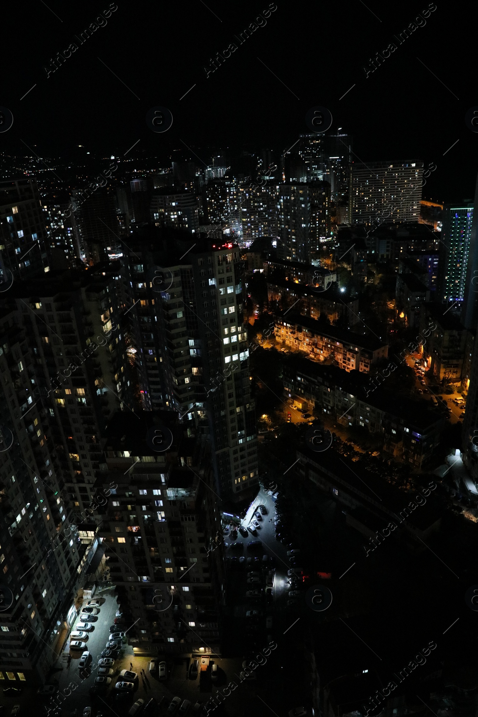 Photo of Picturesque view of city with buildings at night