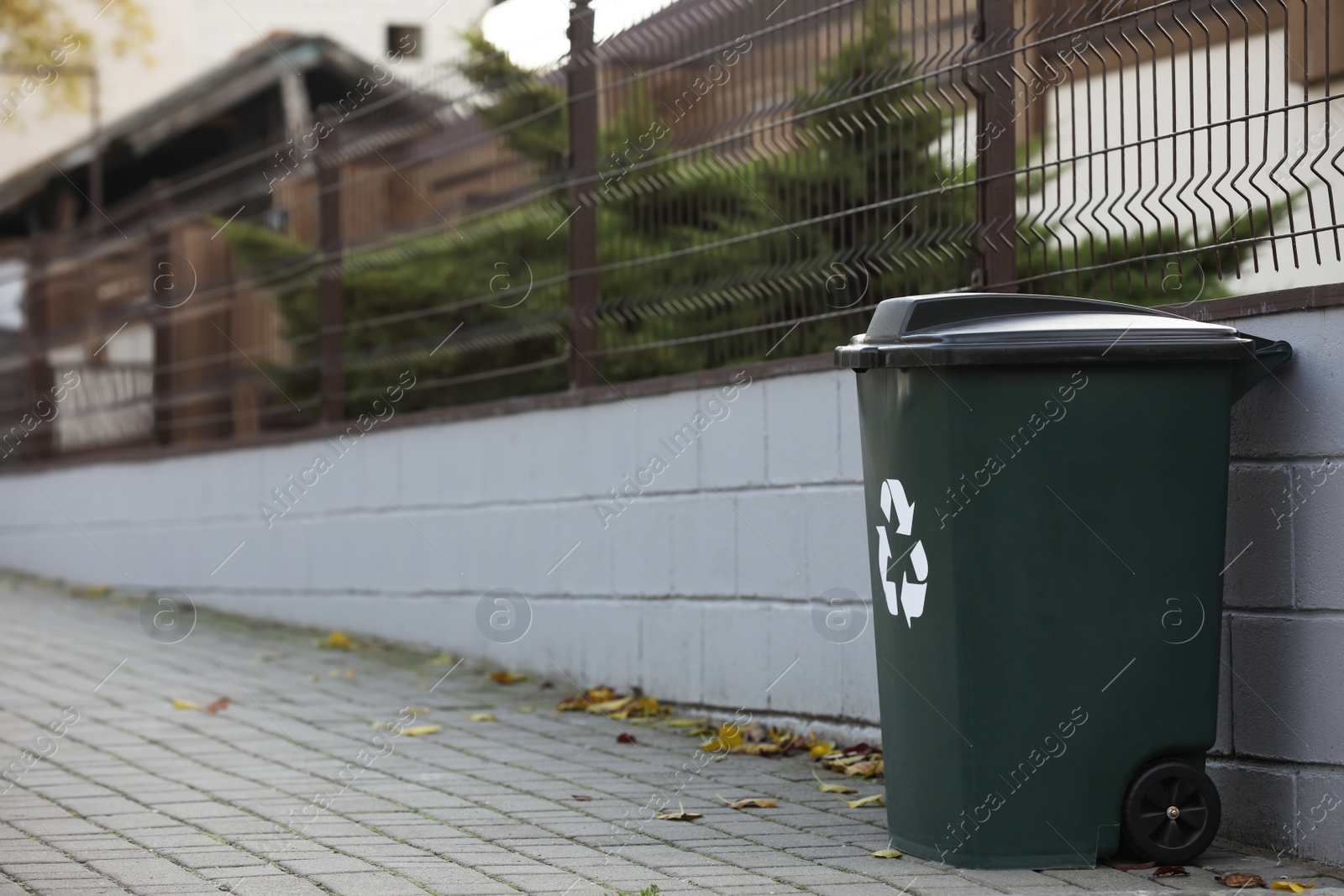 Photo of Garbage bin outdoors, space for text. Waste recycling