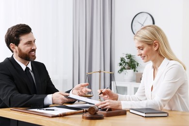 Woman having meeting with lawyer in office