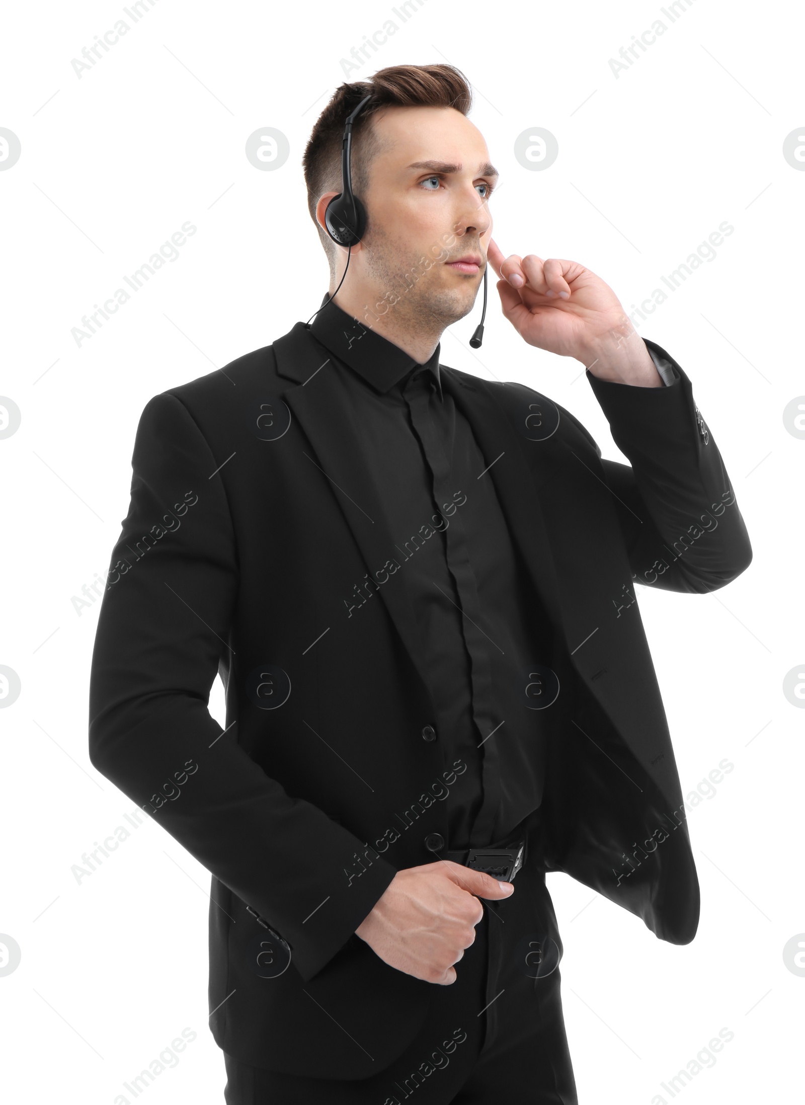 Photo of Male security guard with headset on white background