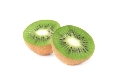 Halves of fresh kiwi on white background