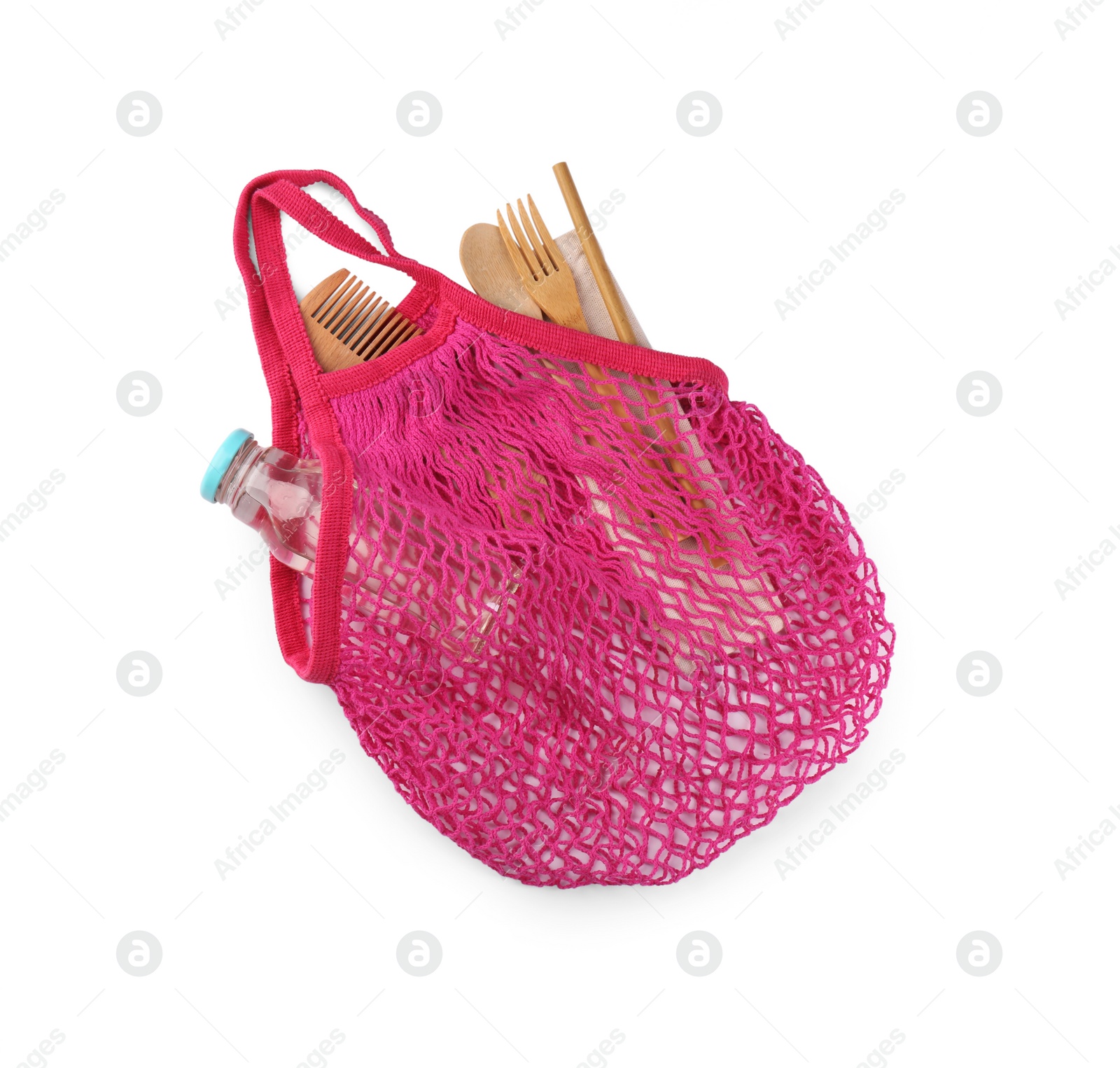 Photo of Mesh bag with different items isolated on white, top view. Conscious consumption