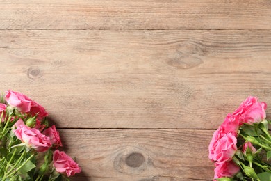 Happy Mother's Day. Beautiful flowers on wooden table, flat lay. Space for text