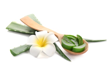 Photo of Wooden spoon with pieces of aloe vera and flower on white background