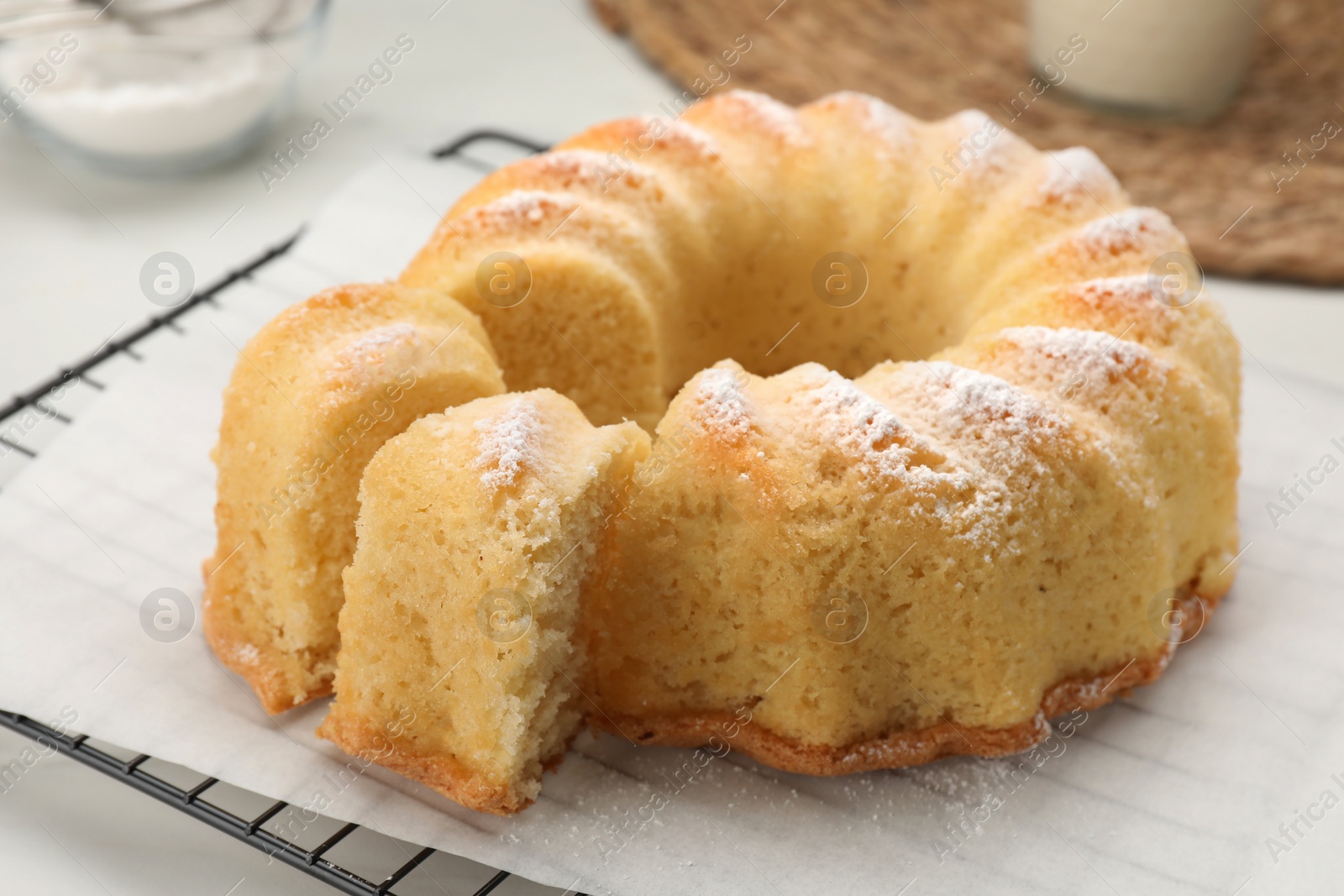 Photo of Delicious freshly baked sponge cake on table, closeup