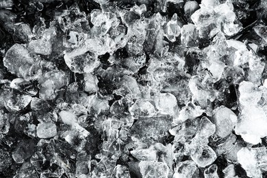 Photo of Clear crushed ice as background, top view