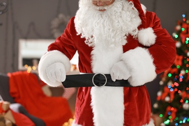 Authentic Santa Claus in traditional costume indoors