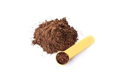 Photo of Spoon and chocolate protein powder isolated on white, top view