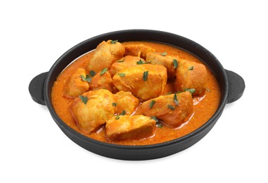 Photo of Delicious chicken curry in pan on white background