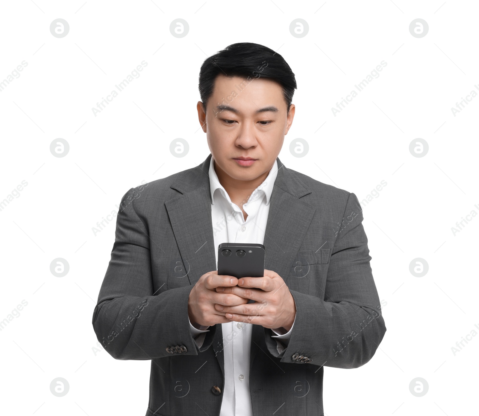 Photo of Businessman in suit using smartphone on white background