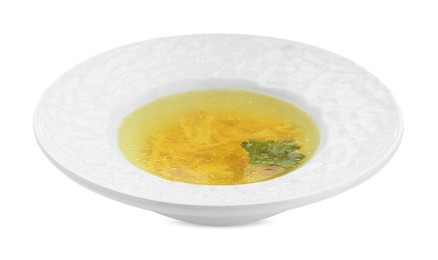 Photo of Delicious chicken bouillon with parsley in bowl on white background