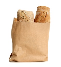 Photo of Paper bag with bread on white background. Space for design