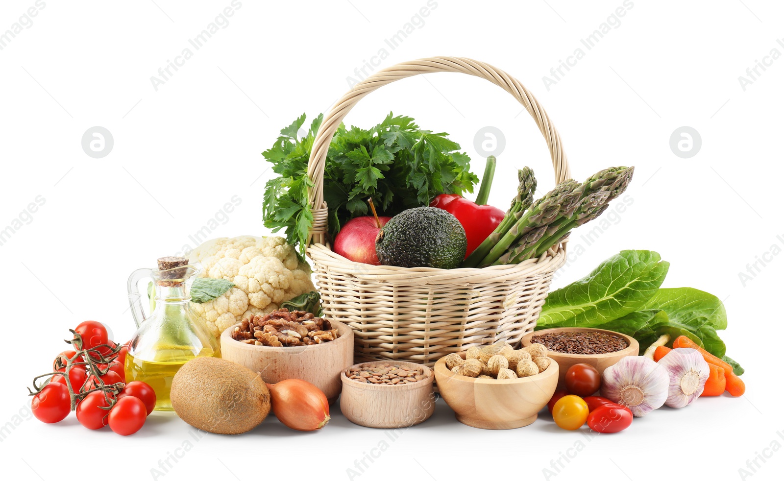 Photo of Healthy food. Basket with different fresh products isolated on white