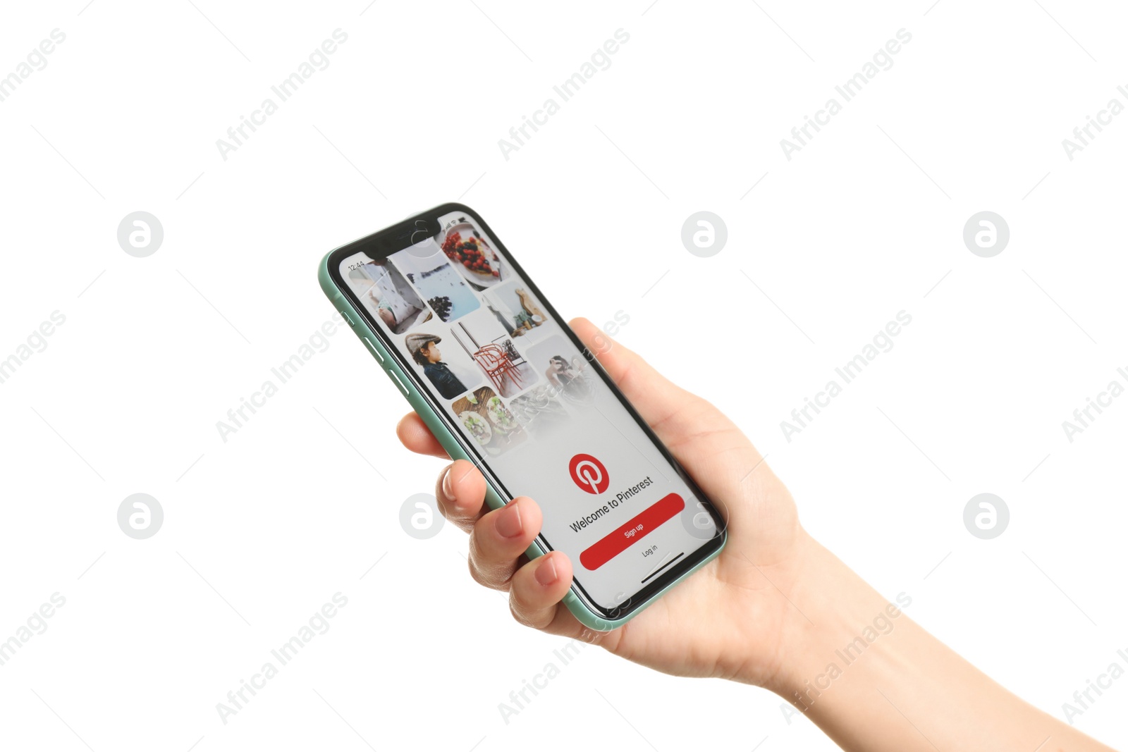 Photo of MYKOLAIV, UKRAINE - JULY 9, 2020: Woman holding  iPhone X with Pinterest app on white background, closeup