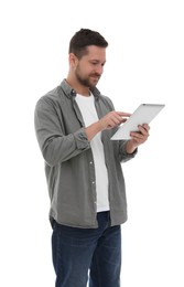 Handsome man using tablet on white background