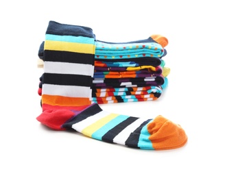 Many new colorful socks on white background