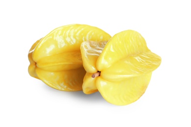 Photo of Delicious ripe carambolas on white background. Exotic fruit