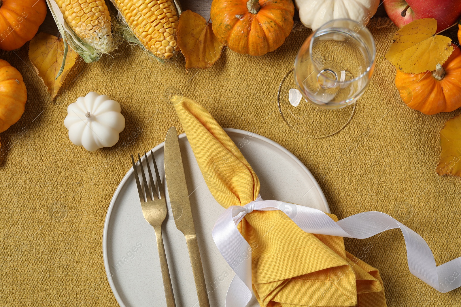 Photo of Happy Thanksgiving day. Beautiful table setting and autumn decoration, flat lay