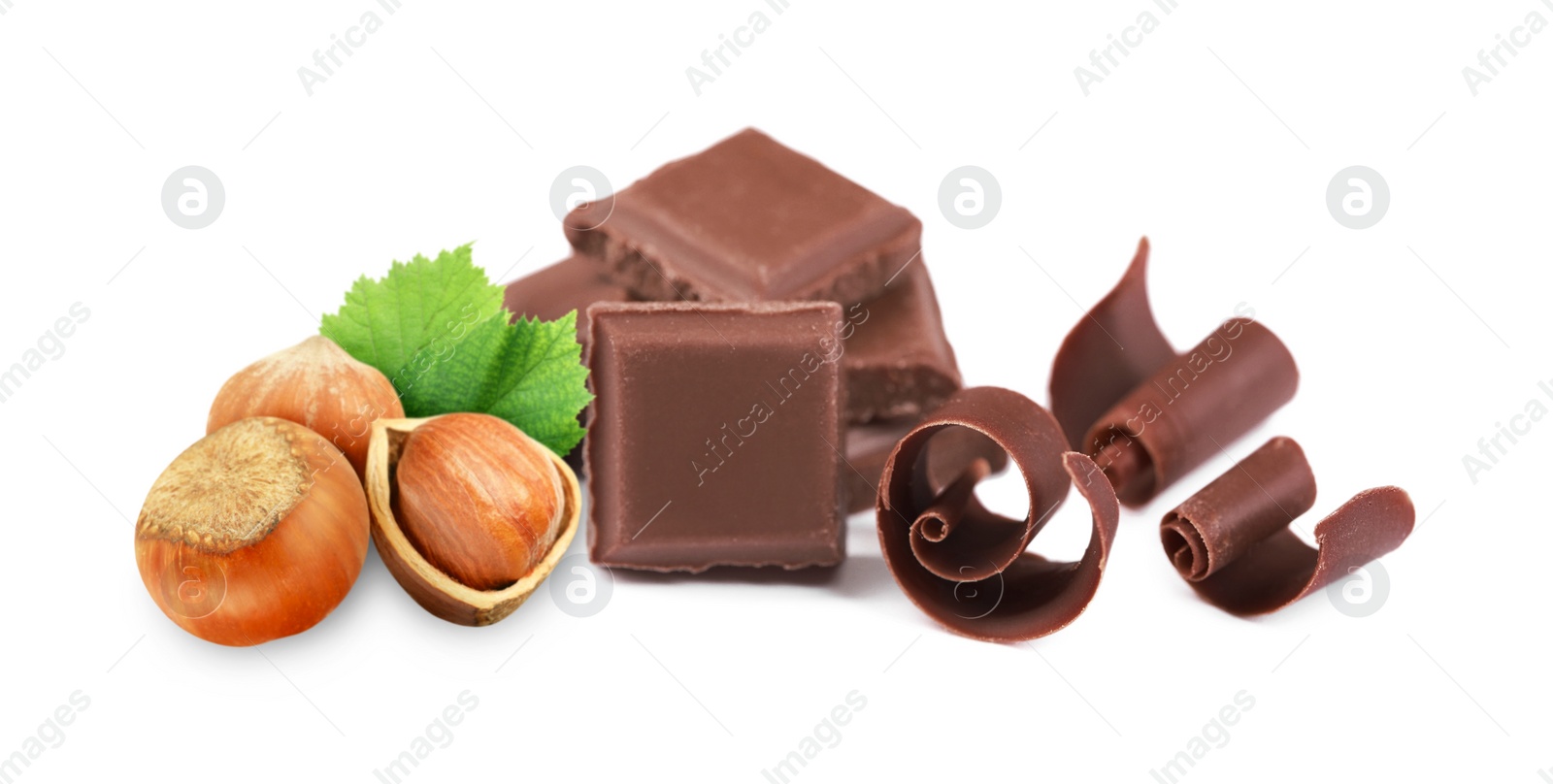 Image of Milk chocolate and hazelnuts isolated on white