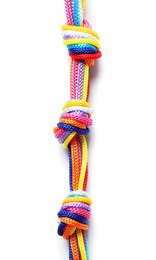 Colorful ropes tied together with knots on white background. Unity concept