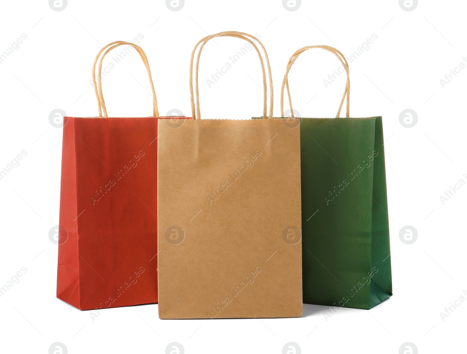 Photo of Mockup of paper shopping bags on white background