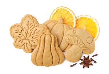 Different tasty cookies and spices on white background, top view