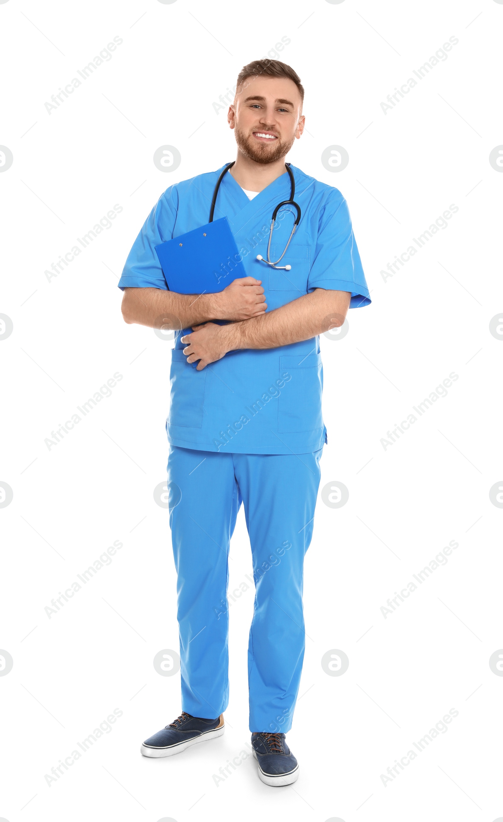 Photo of Full length portrait of medical doctor with clipboard and stethoscope isolated on white