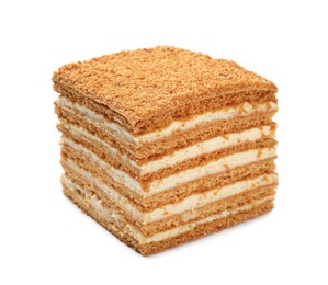 Photo of Slice of delicious layered honey cake isolated on white