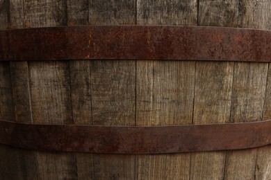 Photo of Traditional wooden barrel as background, closeup. Wine making