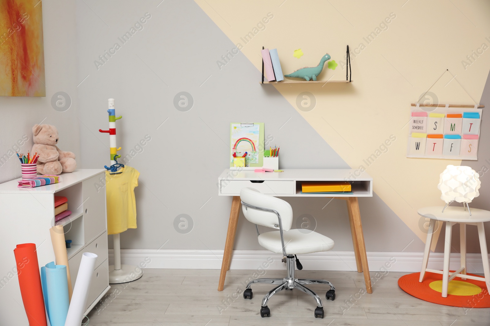 Photo of Stylish child room interior with modern furniture