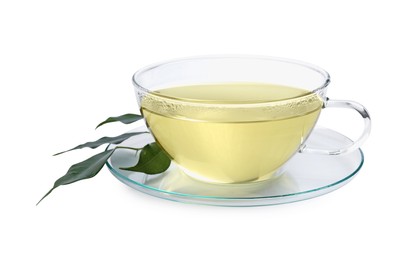 Refreshing green tea in cup and leaves isolated on white