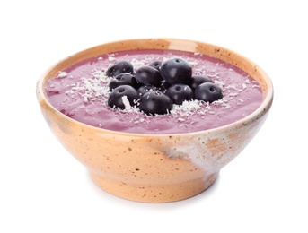 Photo of Bowl with tasty acai smoothie on white background