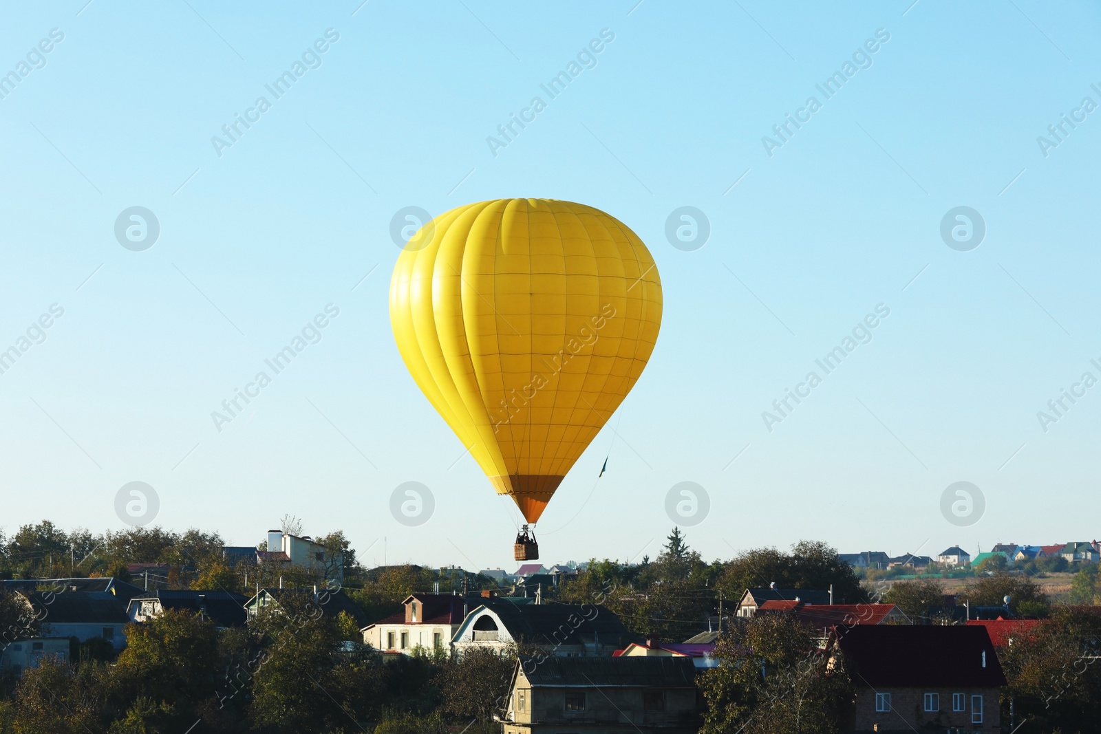 Photo of Beautiful view of hot air balloon flying over countryside